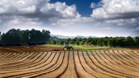 bigstockphoto_Tractor_In_A_Field_4082345